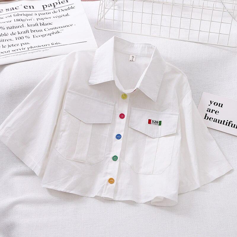 Damen-Poloshirt mit bunten Knöpfen-Bombardina.de
